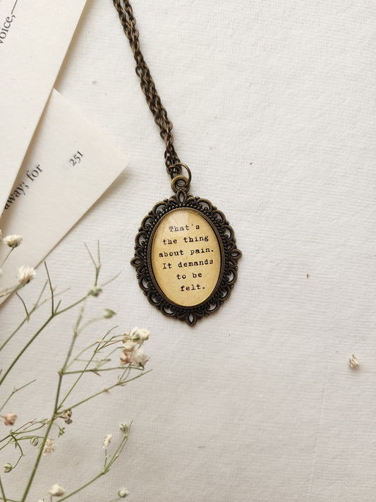 "the thing about pain... " Quote Pendant