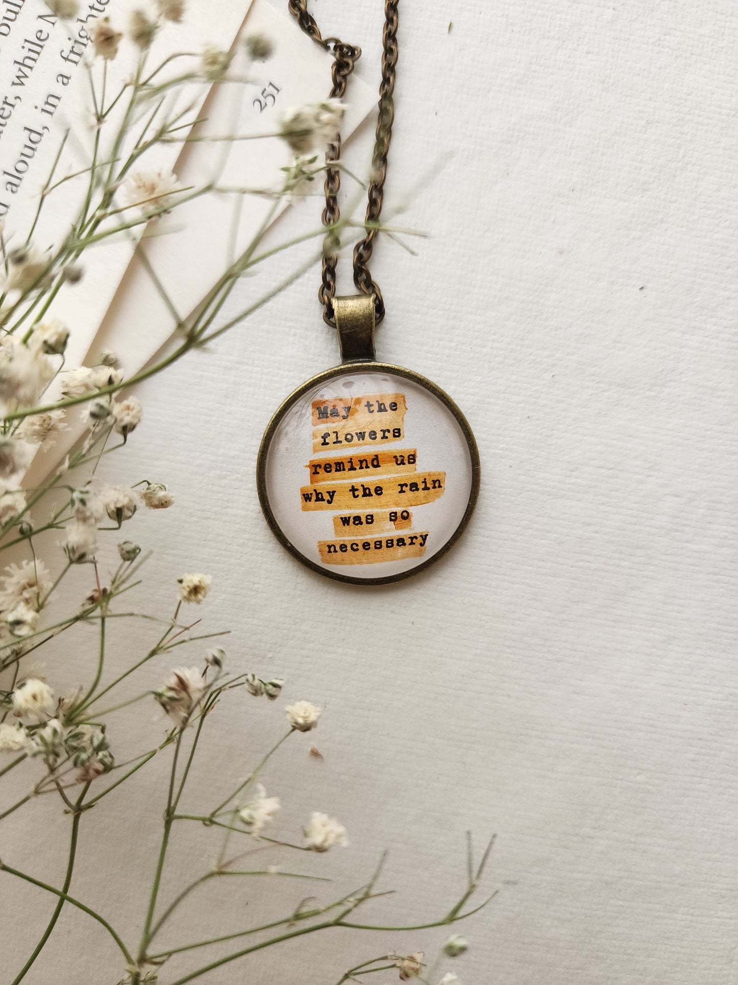 "..flowers remind us.. " Quote Pendant