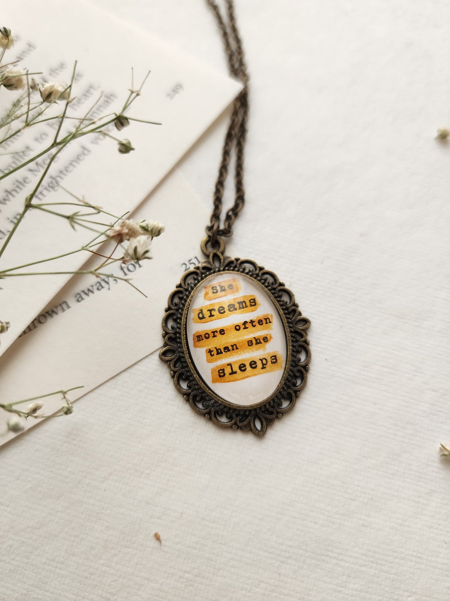 "she dreams...” Quote Pendant