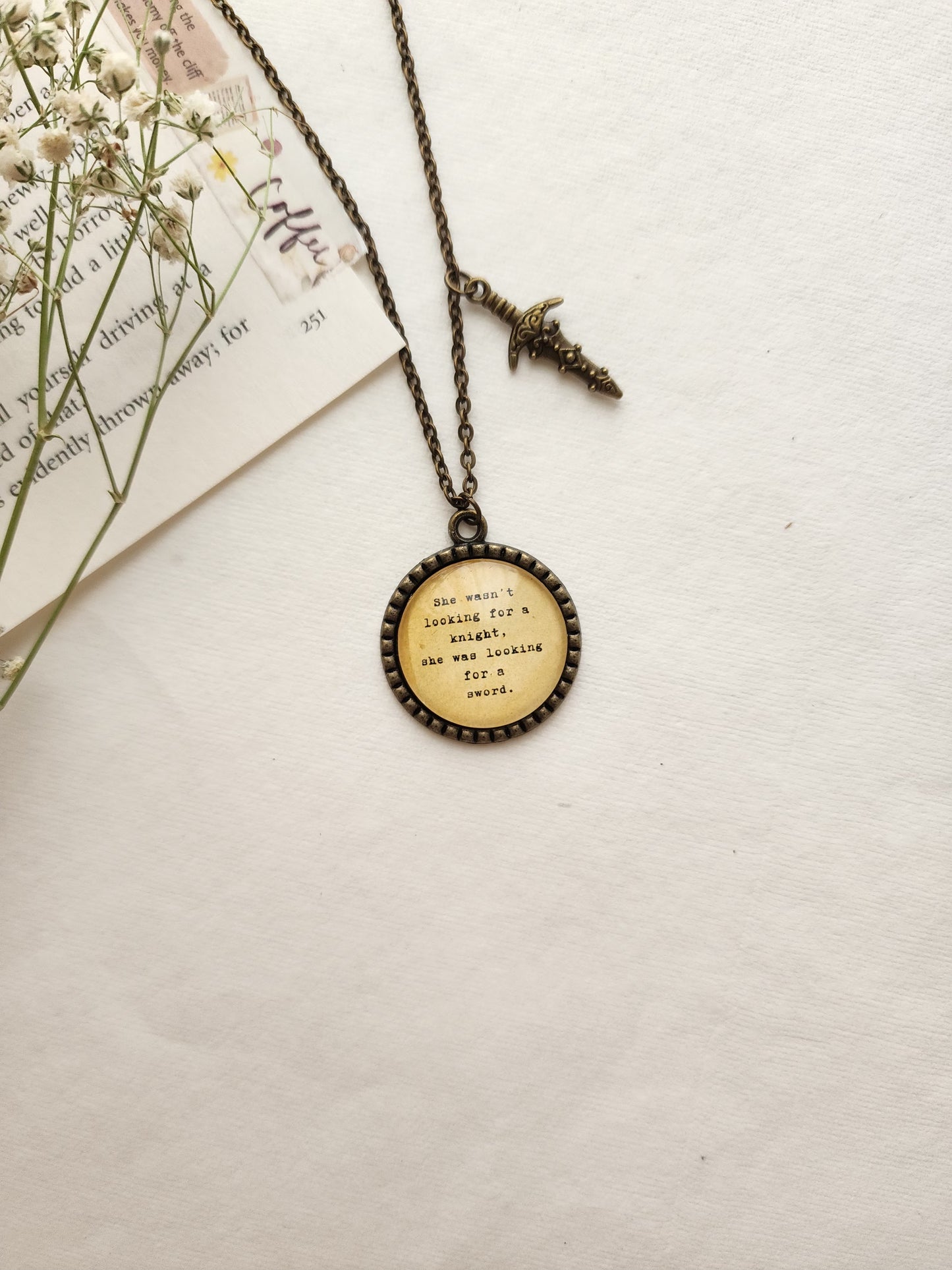"she wasn't looking for a knight...” Quote Pendant