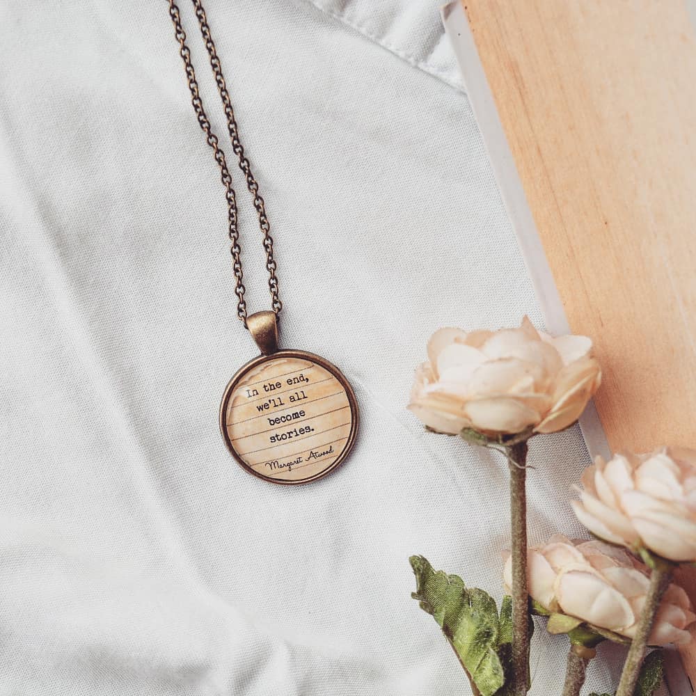 In the end, we'll all become stories. - Margaret Atwood Quote Pendant
