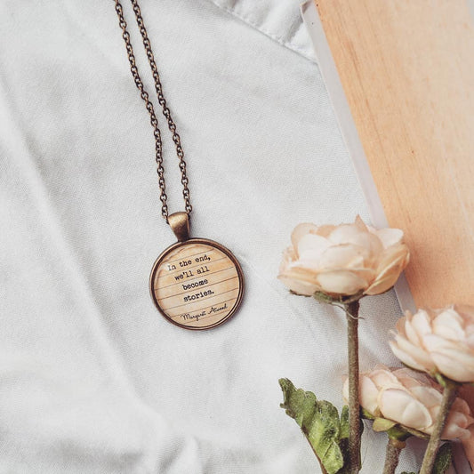 In the end, we'll all become stories. - Margaret Atwood Quote Pendant