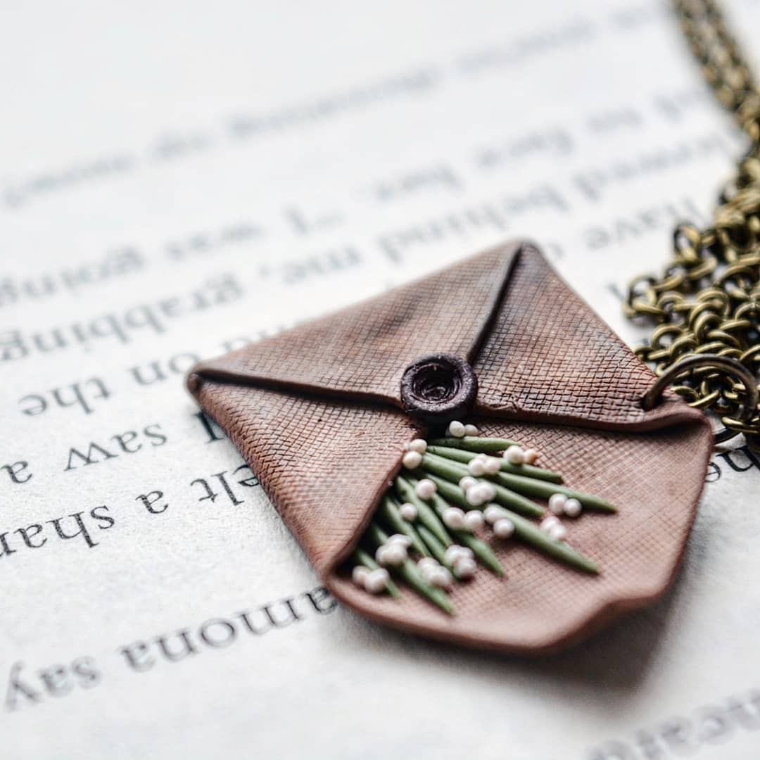 The Envelope with Baby's Breath Flowers Pendant