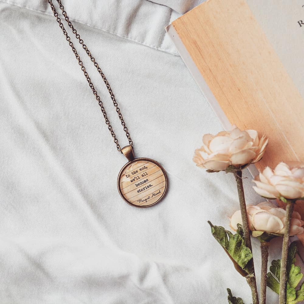 In the end, we'll all become stories. - Margaret Atwood Quote Pendant