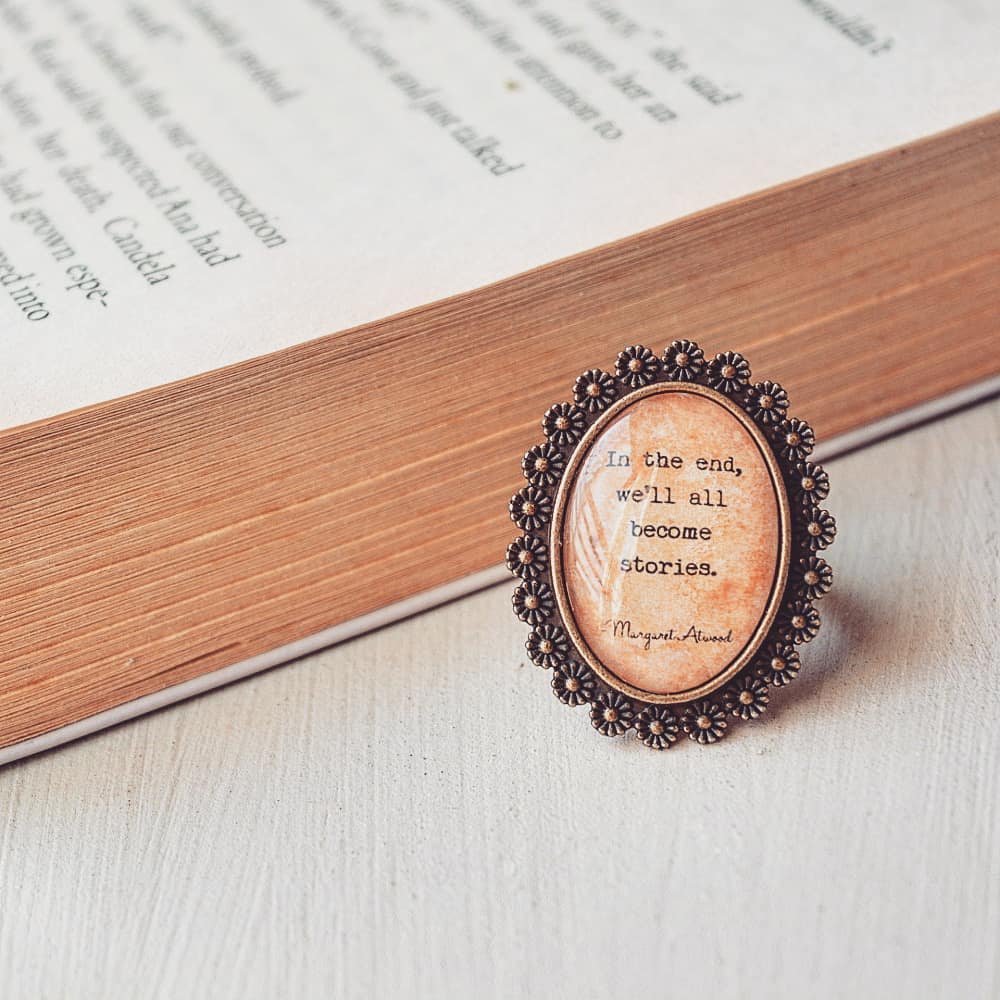 In the end, we'll all become stories - Margaret Atwood Quote Ring