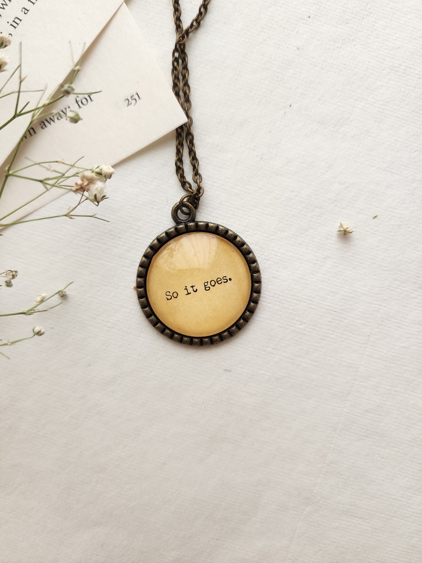 "so it goes.” Quote Pendant