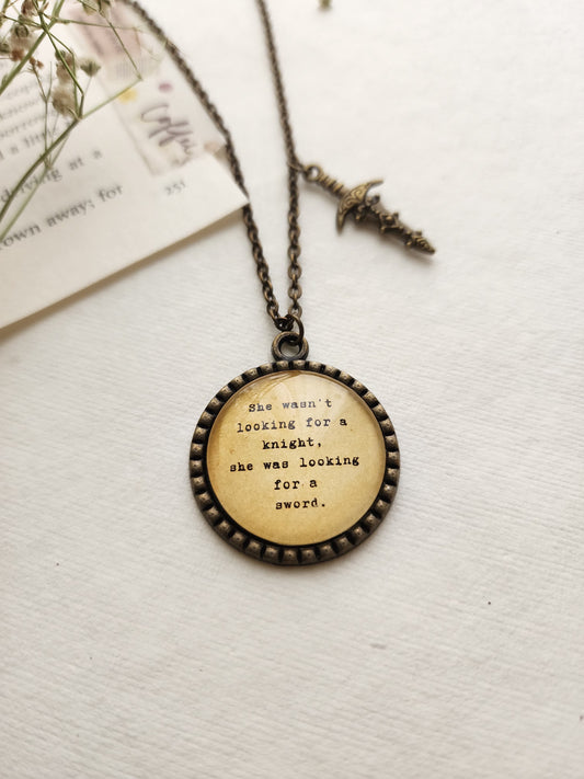 "she wasn't looking for a knight...” Quote Pendant