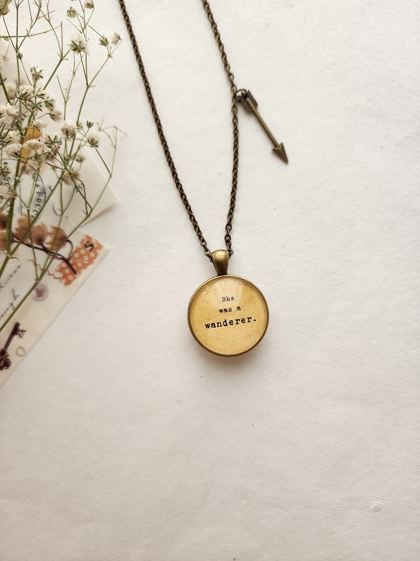 "She was a wanderer...” Quote Pendant