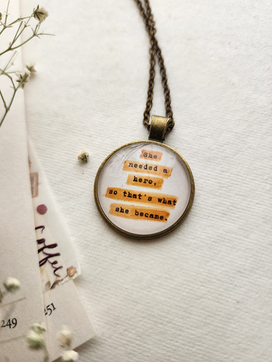 "She needed a hero...” Quote Pendant