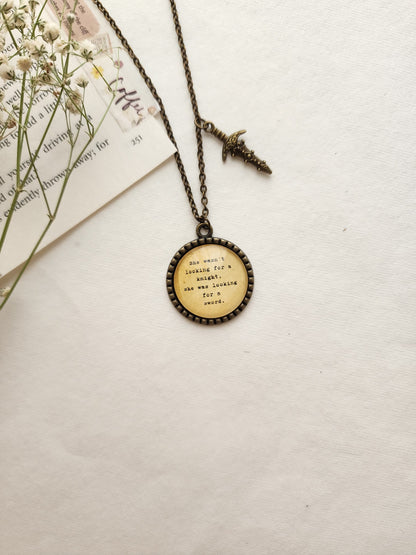 "she wasn't looking for a knight...” Quote Pendant
