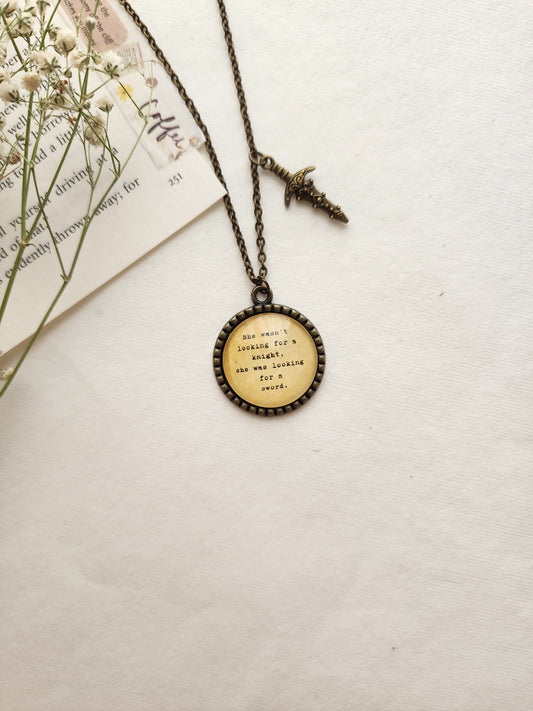 "she wasn't looking for a knight...” Quote Pendant