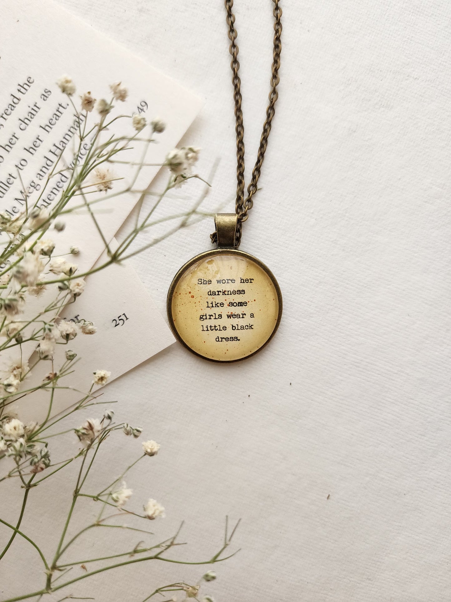 "she wore her darkness....” Quote Pendant