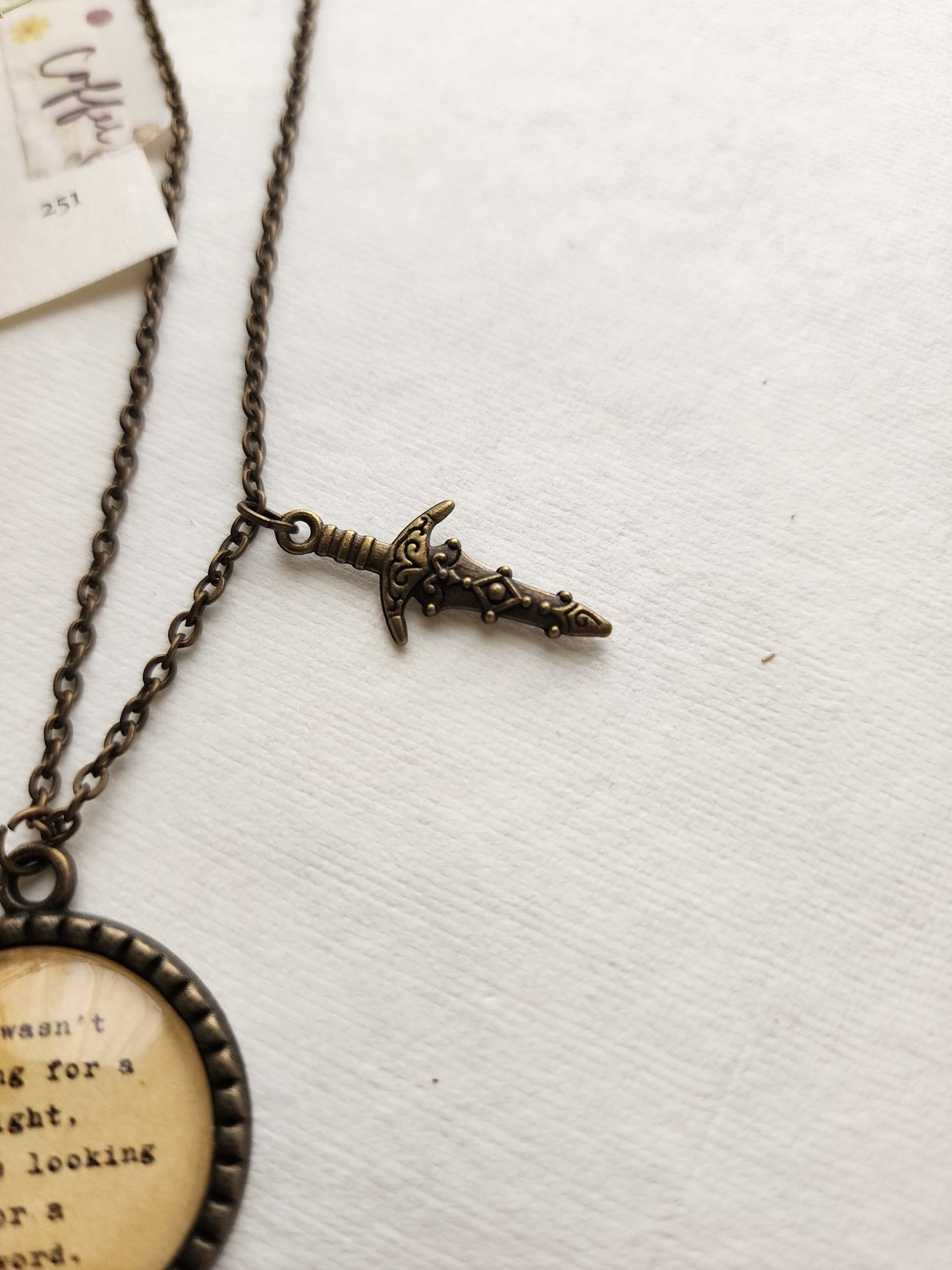 "she wasn't looking for a knight...” Quote Pendant