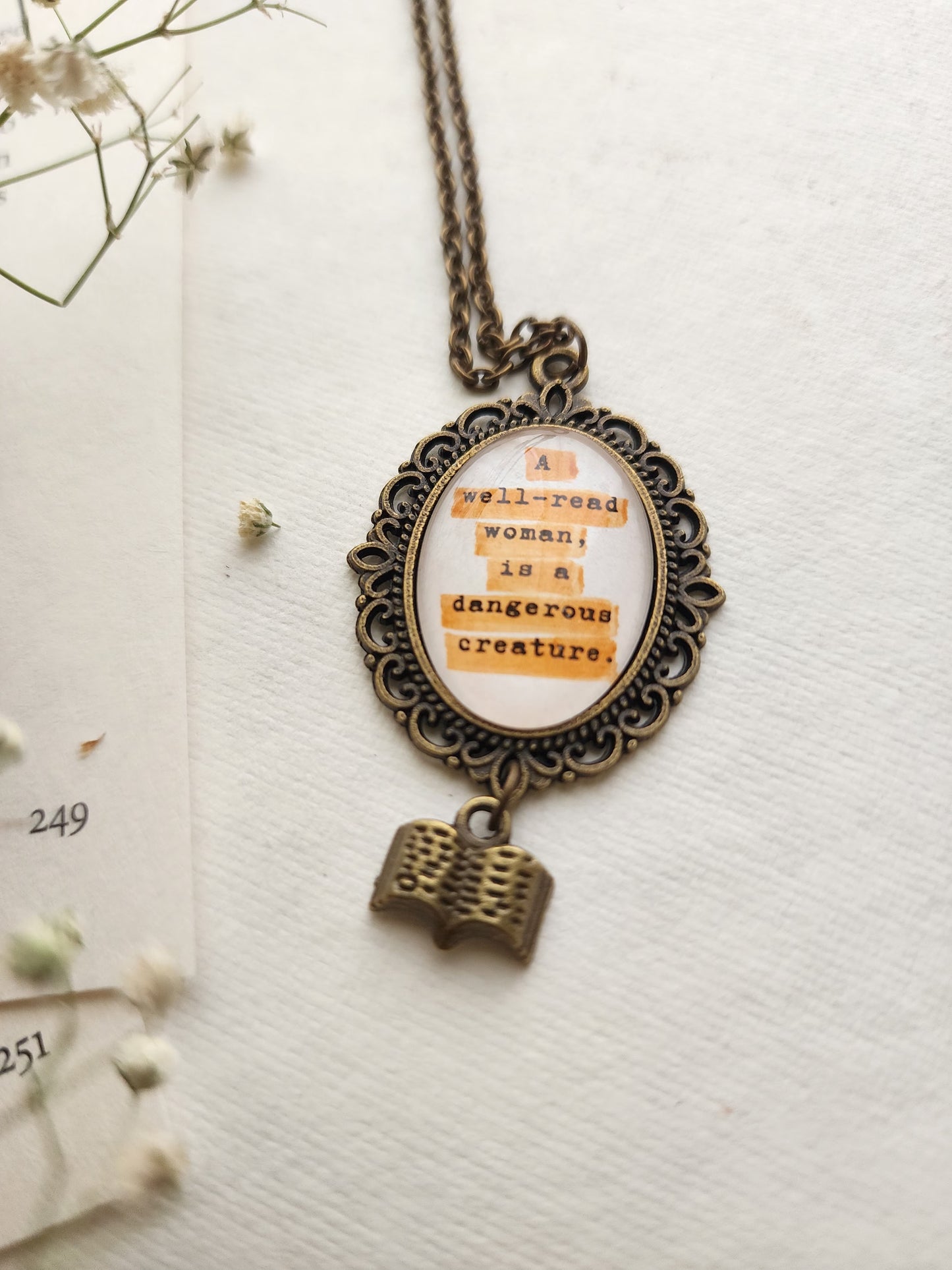 "A well-read woman...” Quote Pendant