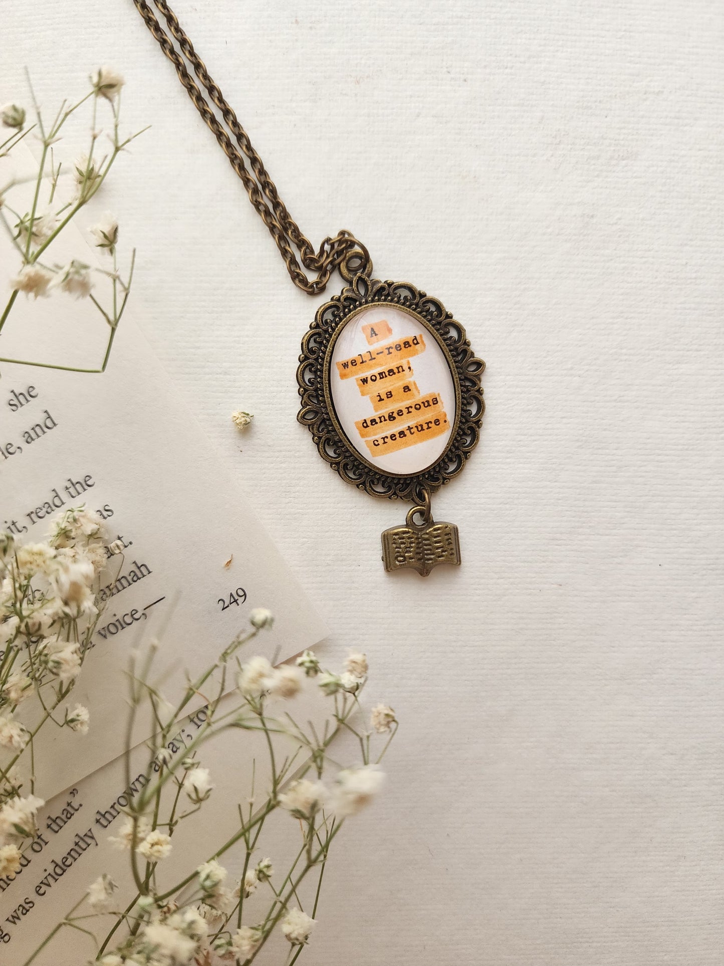 "A well-read woman...” Quote Pendant