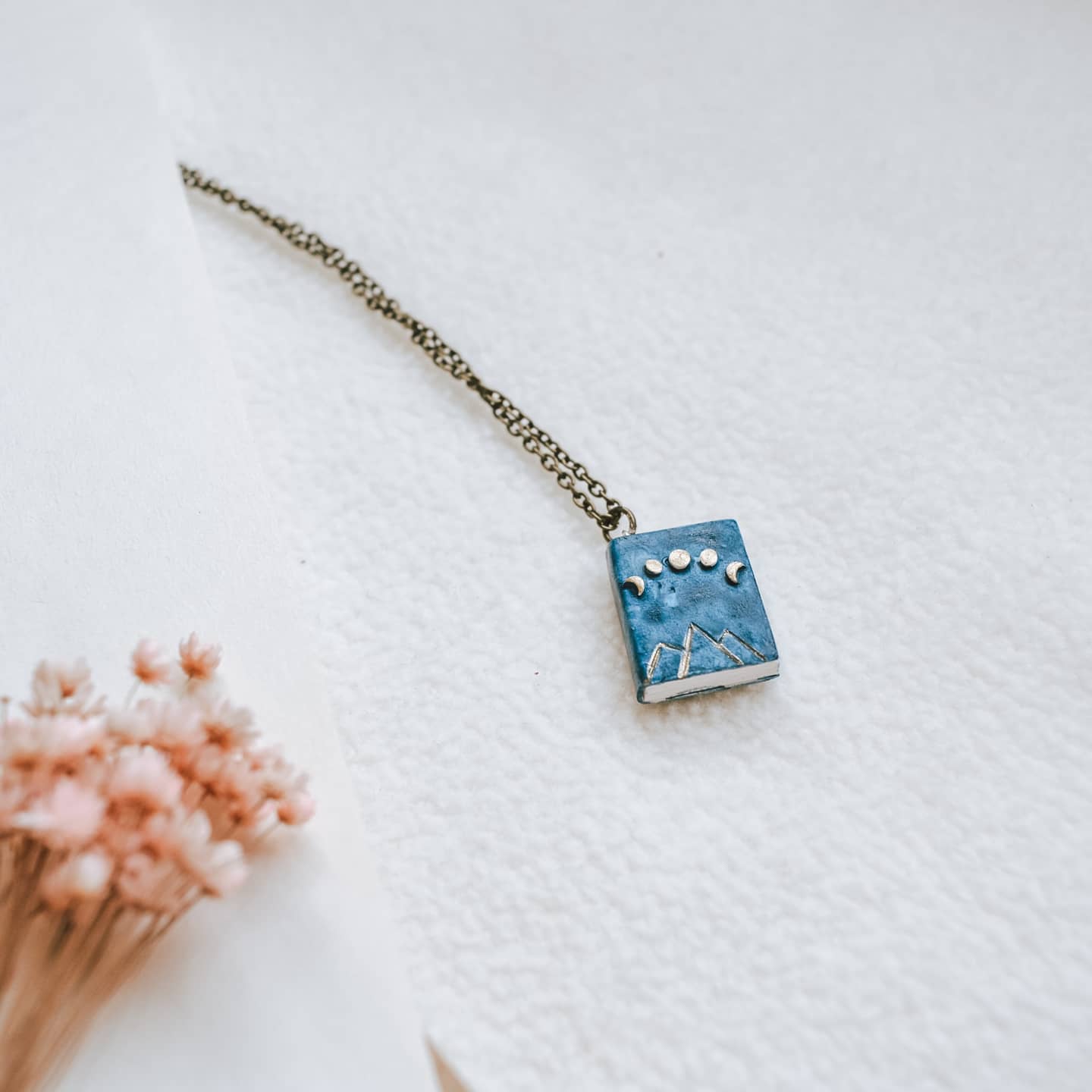 Phases of Moon -  Book Shaped Pendant